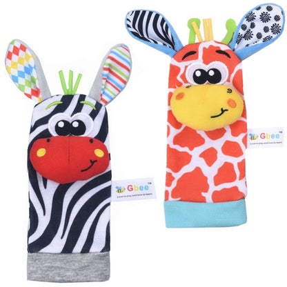 Two pairs of baby socks designed as animal characters, featuring a zebra and a giraffe with colorful patterns and details.