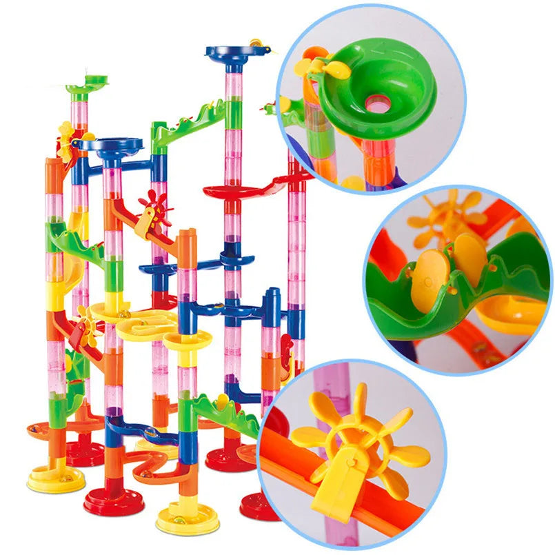 Colorful marble run set with various tracks, funnels, and spinning elements, designed for kids' play.
