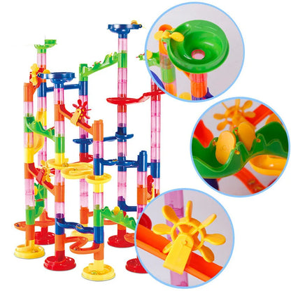 Colorful marble run set with various tracks, funnels, and spinning elements, designed for kids' play.