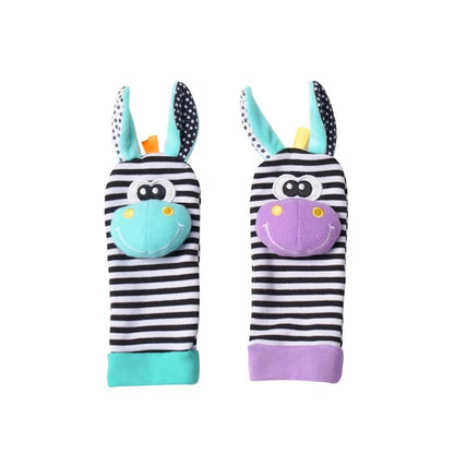 Two striped baby socks designed as animal characters with smiling faces and colorful ears, suitable for infants.
