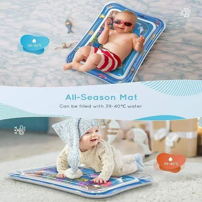 Inflatable water play mat with two babies, one on top and one beside, colorful underwater designs, soft edges
