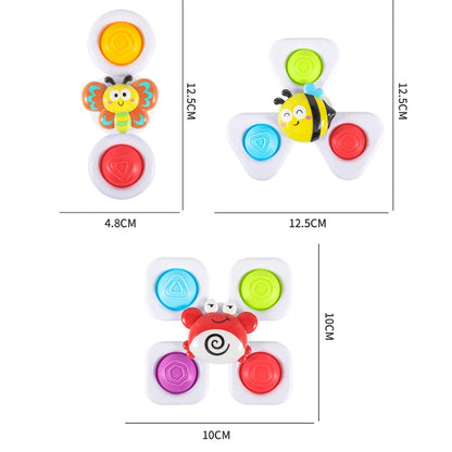 Three colorful suction cup spinning top toys featuring a butterfly, bee, and crab design, suitable for kids.