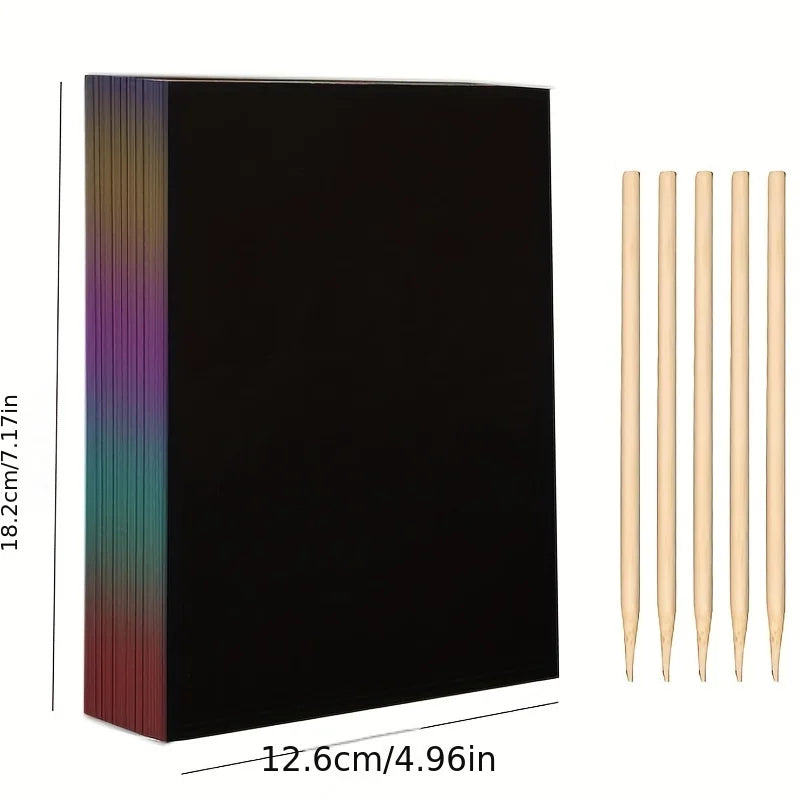 50 black scratch paper sheets with rainbow edges and five wooden styluses for kids' art projects.