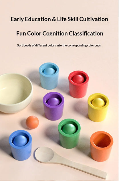 Colorful sorting cups in purple, blue, green, orange, and red with wooden beads and a spoon on a light background.