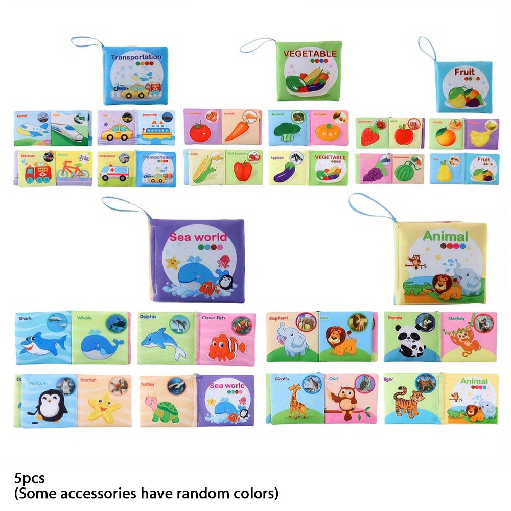 Set of five colorful baby cloth books featuring transportation, vegetables, fruits, sea world, and animals with various