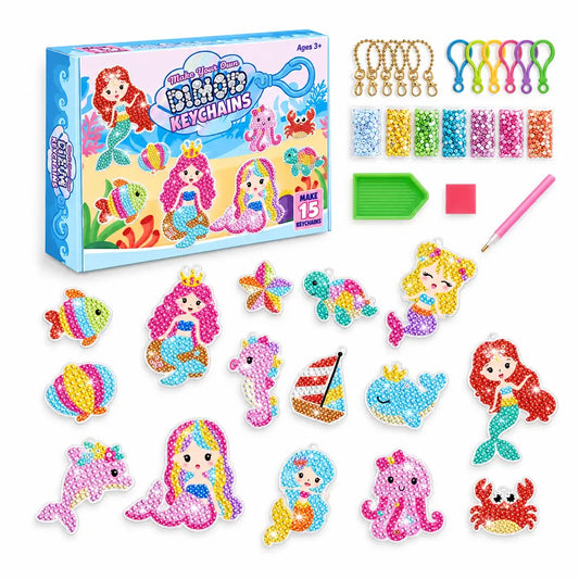 Craft kit with mermaid-themed keychains and accessories on a white background