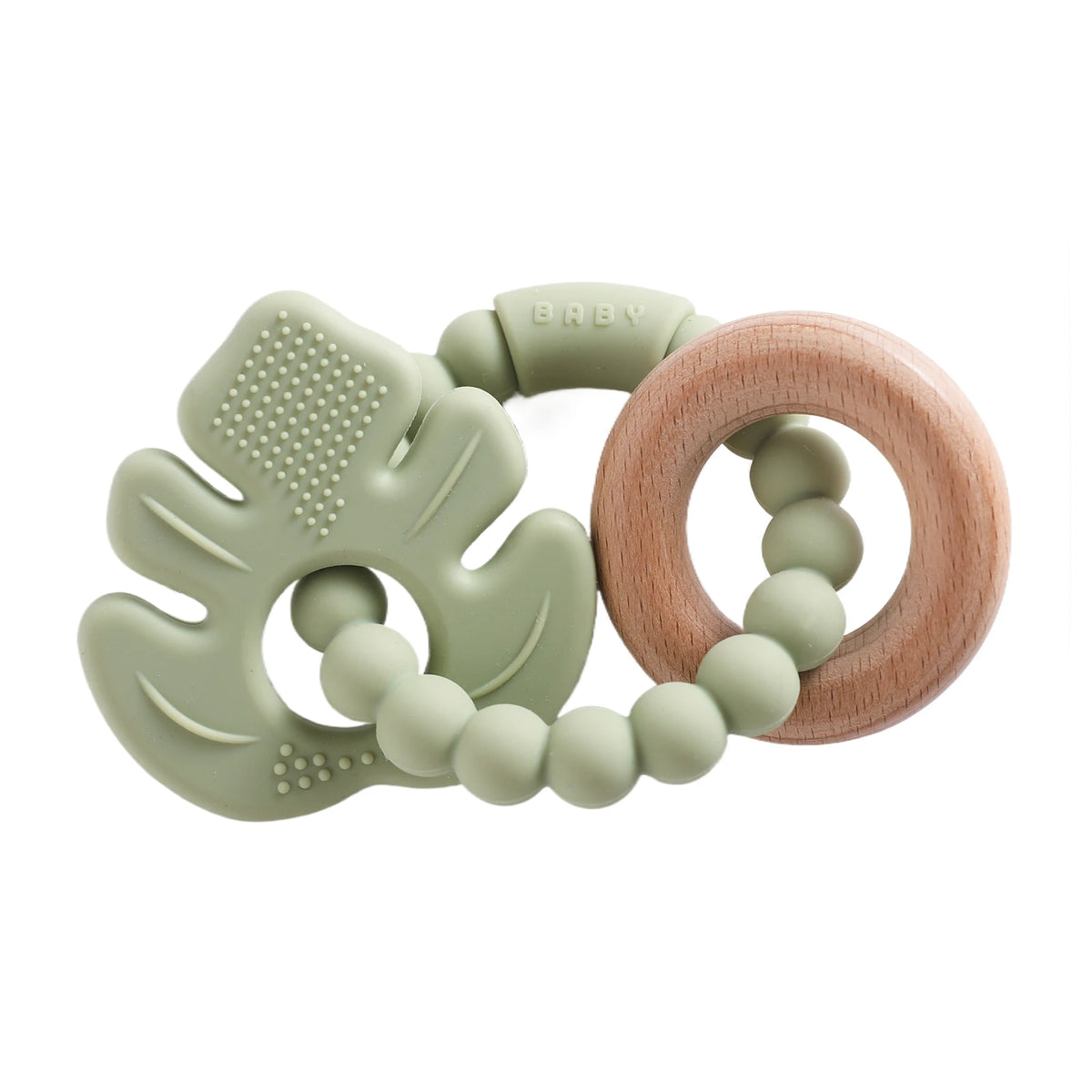 Silicone teether in green and wood, featuring a leaf shape and round wooden ring, designed for toddlers.