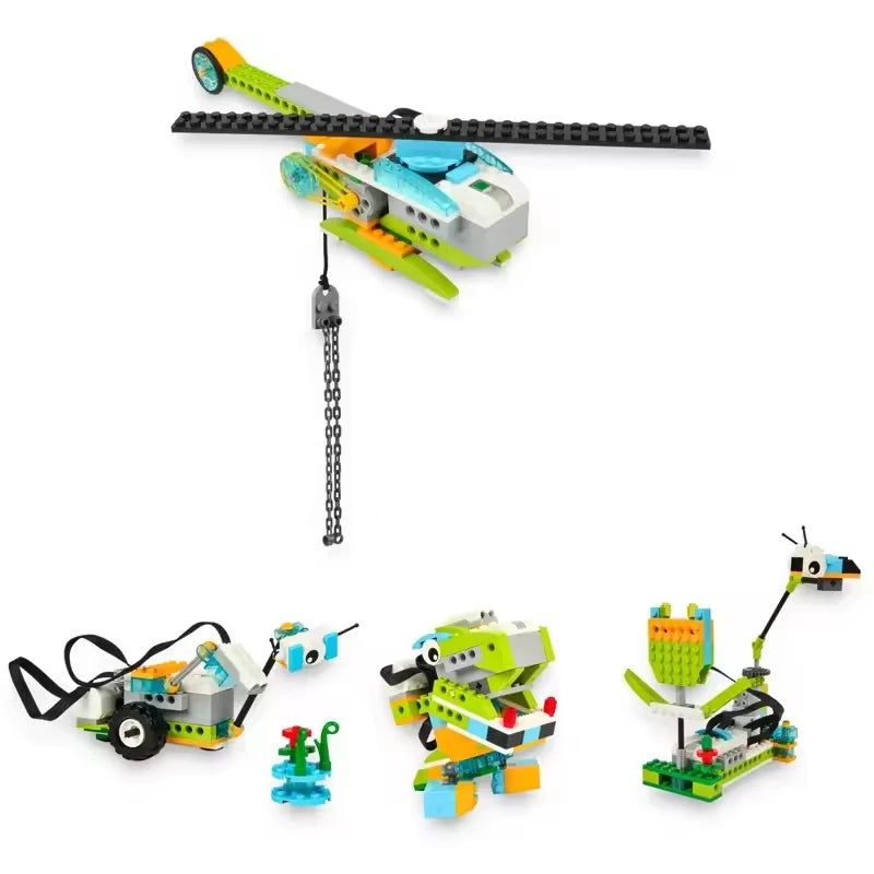 Colorful robotics kit featuring a helicopter, car, and other models made from building blocks.