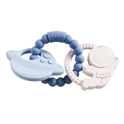 Silicone teether in blue and white, featuring a planet and astronaut design, with round beads in blue and white.